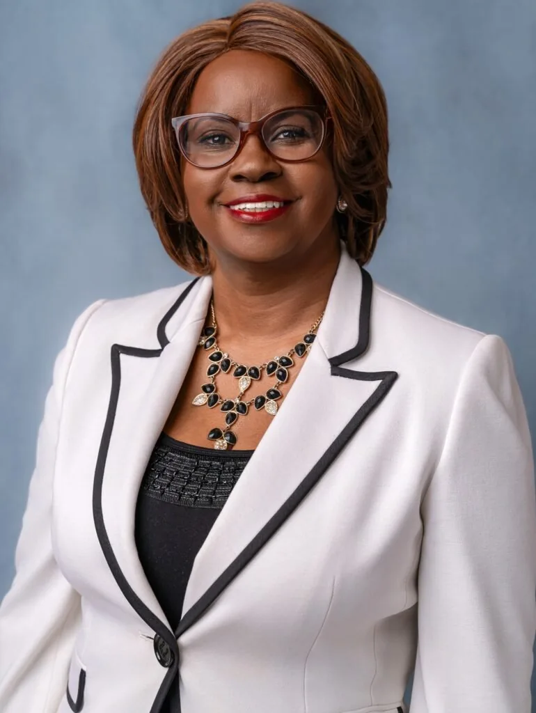 Rev. Dr. G. Dianne Lewis in a white jacket